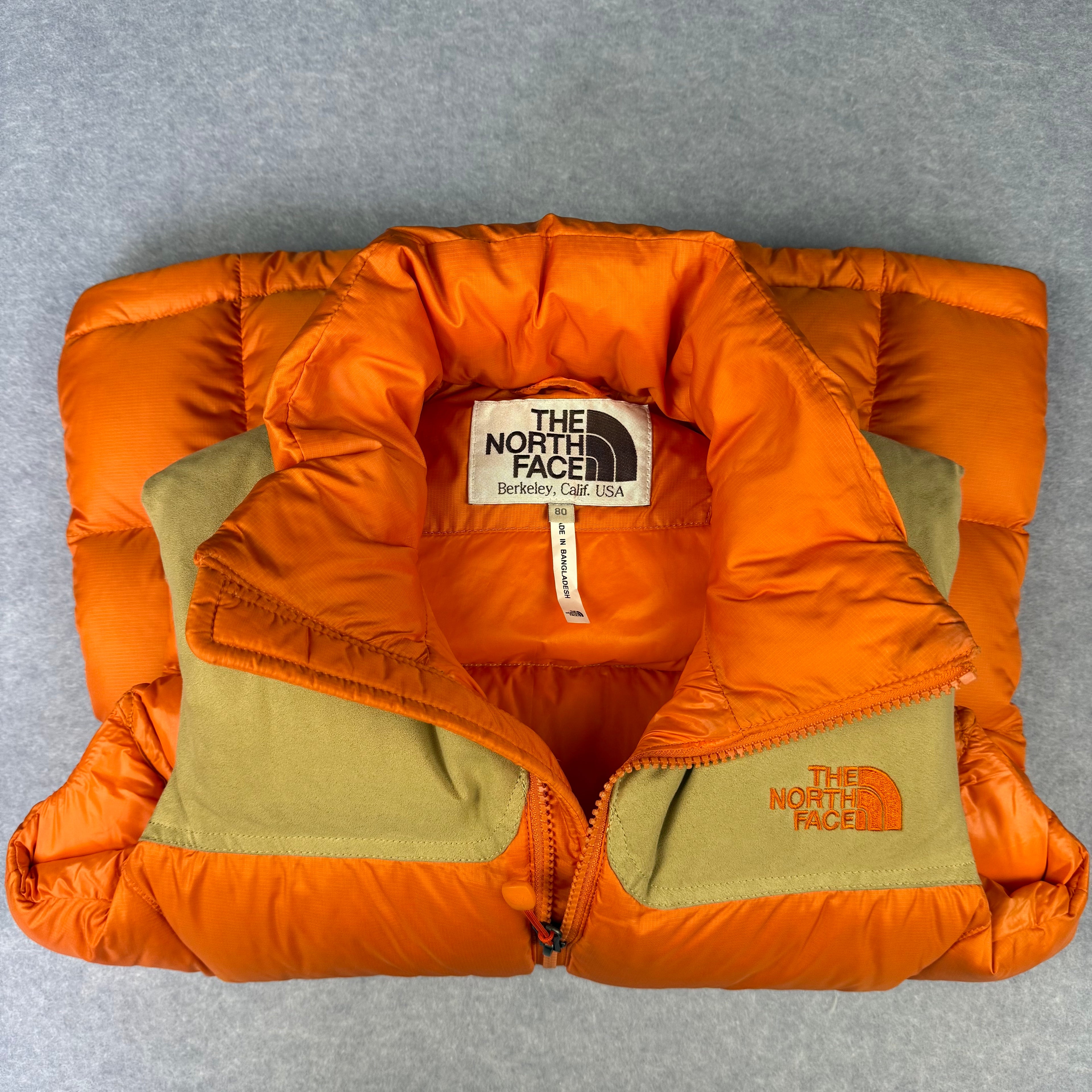 VINTAGE The North Face 1996 Nupste Down Vest Womens size XS Orange and Tan